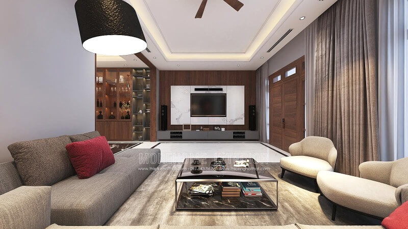 Trang trí tường phòng khách đẹp với điểm nhấn từ đá trắng vân mây kết hợp cùng gỗ ốp tường cao cấp. Mẫu thiết kế và thi công nội thất biệt thự
