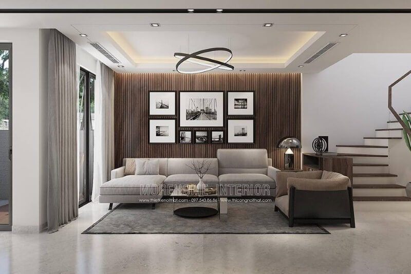 Gỗ ốp tường kết hợp với tranh đen trắng địa danh nổi tiếng đã tạo nên một trang trí tường phòng khách đẹp độc đáo.