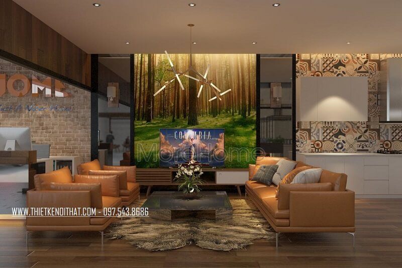 Không gian tiếp khách hàng được trang trí hiện đại với sự kết hợp giữa bộ sofa bọc da cao cấp và bức tranh dán tường màu sắc, tạo nên điểm nhấn nổi bật cho không gian.
